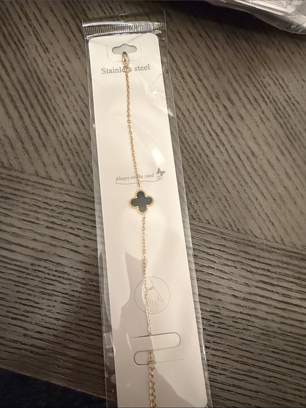Gold Stainless Steel Bracelet with Black Clover Charm